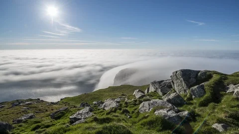 Sunset with inversion flowing over the coastline Stock Footage 122954195