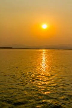 Sunset on Irrawaddy river Stock Photos