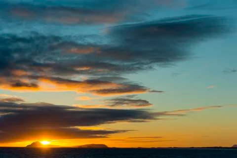 Sunset on island Stock Photos