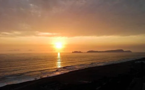 Sunset with island. Stock Photos