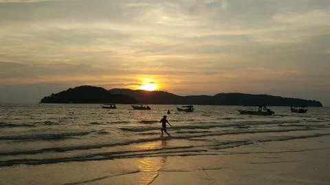 Sunset on island Stock Photos