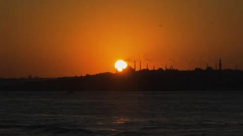 Sunset in Istanbul, sun is setting behind the Blue Mosque Stock Footage 161753281