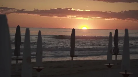 Sunset at italian beach with clouds Stock Footage 71210494