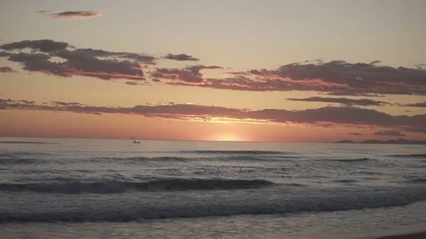 Sunset at italian beach with clouds Stock Footage 71210889