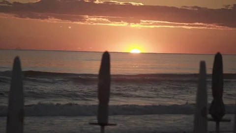 Sunset at italian beach with clouds Stock Footage 71210924