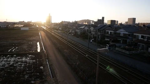 Sunset in Japan with moving train Video stock 86851496