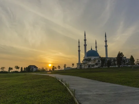 Sunset at jogging park near at mosque  4K Stock Footage 80126330