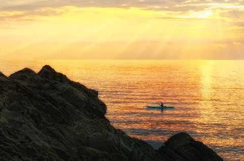Sunset kayaking Stock Photos
