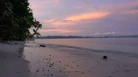 Sunset at Kri Island in Raja Ampat Indonesia Stock Footage