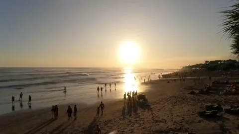 Sunset on kuta beach bali Stock Footage 230474575