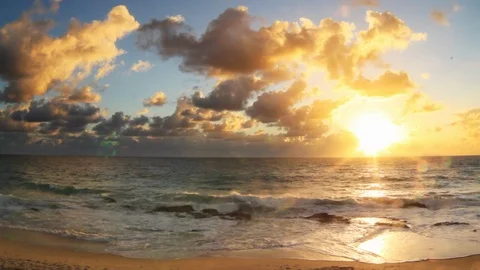 Sunset in Laguna Beach with orange clouds over ocean Stock Footage 128092028