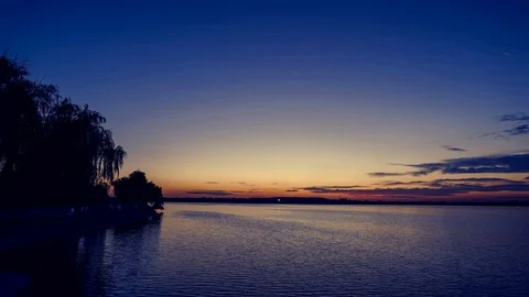 Sunset by the lake, 4k video time lapse Stock Footage 99429129
