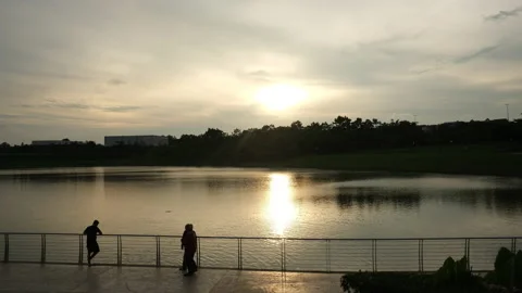 Sunset at lake and human interest Stock Footage 202389258
