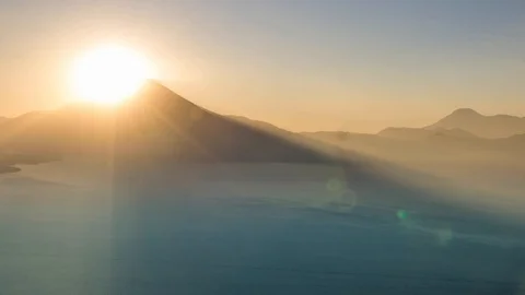 Sunset at lake atitlan, view on volcano San Pedro, orange clouds timelapse Stock Footage 114709571