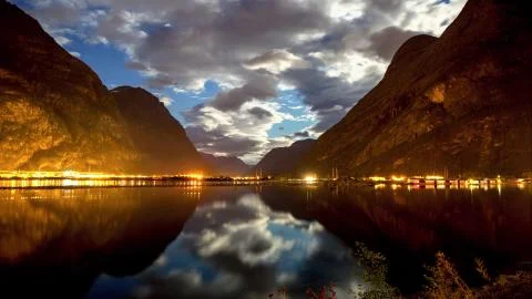 Sunset on a lake between mountains Stock Photos