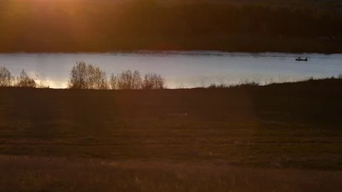 Sunset on the lake, boat Video stock 76047654