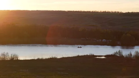 Sunset on the lake, boat Video stock 76047668