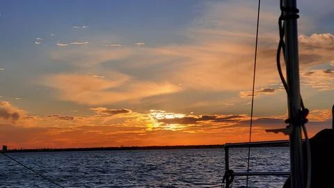 Sunset on the lake off a boat Stock Photos