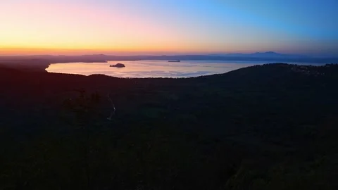 Sunset on the lake of bolsena Video stock 220737764