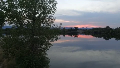 Sunset Lake Boom Up 1 Stock Footage 115039243