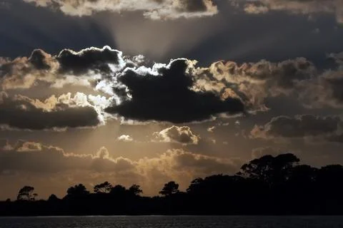 Sunset in the lake with clouds 写真素材