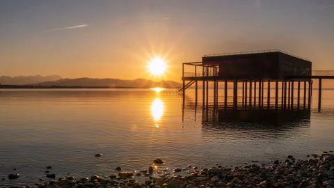 Sunset lake constance with Beach house Video stock 197402086