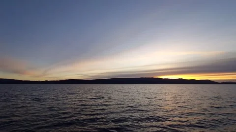 Sunset on Lake Constance panoramic view with colorful clouds in the sky Stock Footage 229811390