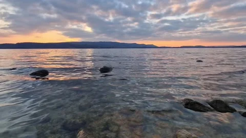 Sunset at Lake Constance in winter with beautiful cloud atmosphere Stock Footage 224730217
