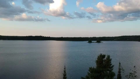 SUNSET AT A LAKE. DIAGONAL DESCENT Видео 137072863