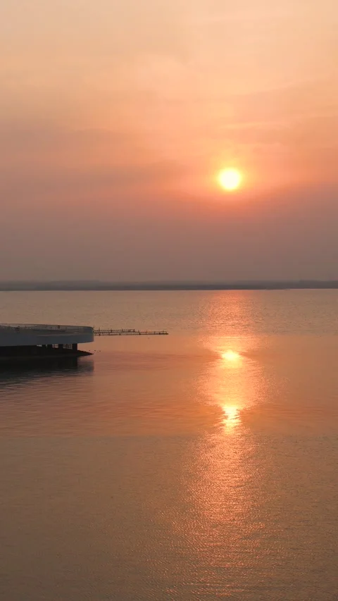 Sunset at the lake in the evening Stock-Footage 346933944