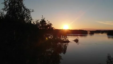 Sunset on lake. Flying forward to the lake Stock Footage 134800597