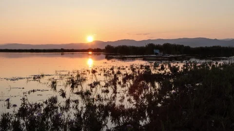 Sunset on the lake Stock Footage 107513905