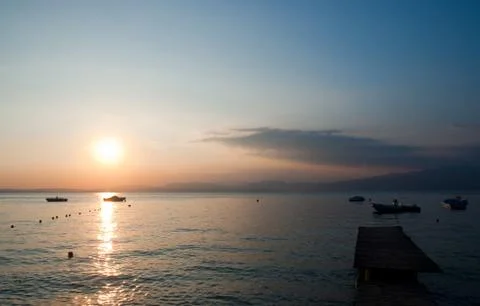 Sunset on lake garda Stock Photos