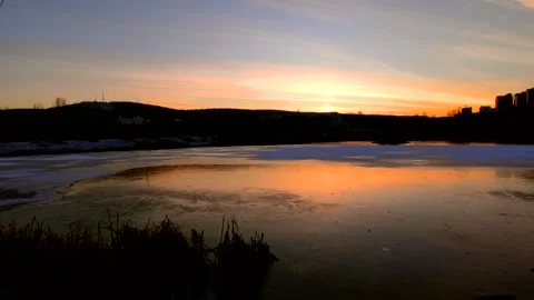 Sunset on the lake with ice Video stock 220501548