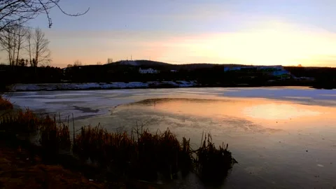 Sunset on the lake with ice Stock Footage 220502315