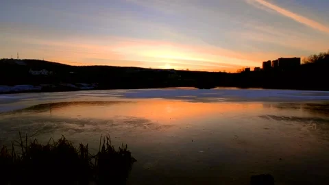 Sunset on the lake with ice Stock Footage 220502567