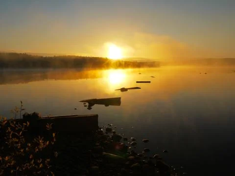 Sunset lake landscape Stock Photos