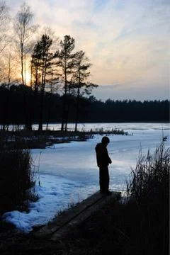 Sunset on the lake in March Stock Photos