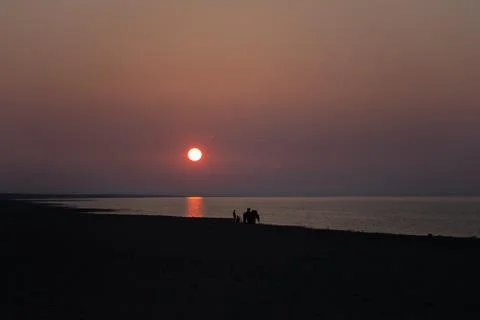 Sunset on a lake in Mongolia Stock Photos