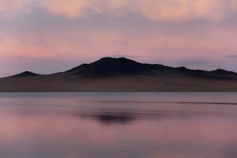 Sunset on a lake in Mongolia 스톡 사진