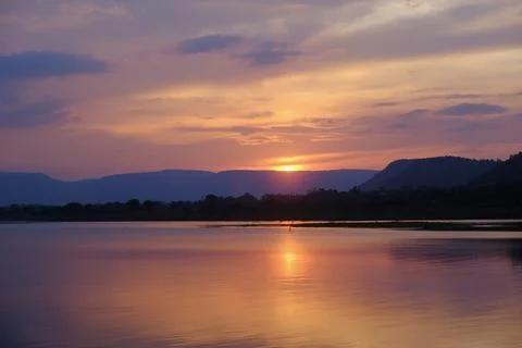 Sunset lake mountain reflection water landscape create tranquil horizon wit.. Stock Photos