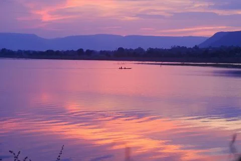 Sunset lake mountain reflection water landscape twilight create tranquil sc.. Stock Photos