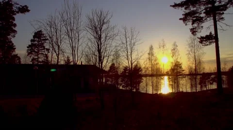Sunset on the lake. Panorama of sunset reflected in water Vidéo 67533369