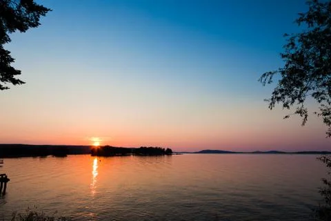 Sunset on a lake Stock Photos