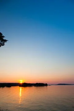 Sunset on a lake Stock Photos