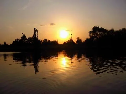 Sunset on the lake Stock Photos