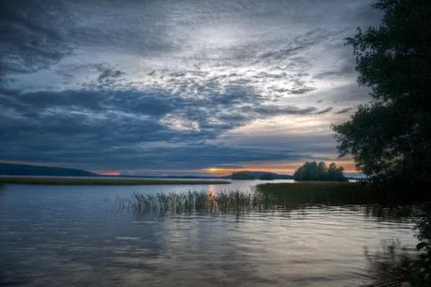 Sunset at a lake Stock Photos