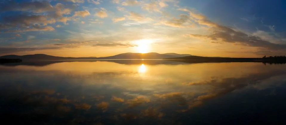 Sunset on a lake Stock Photos