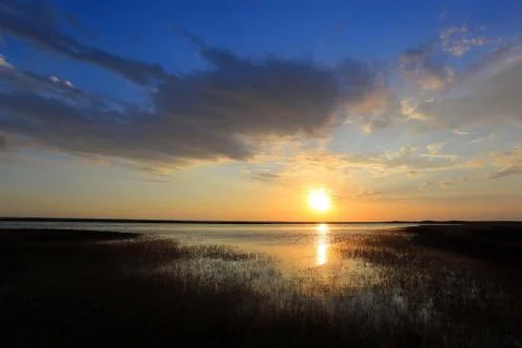 Sunset on lake Stock Photos