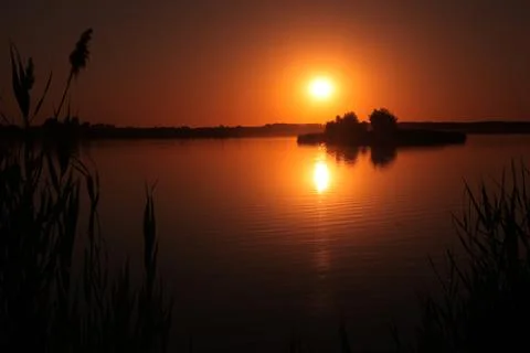 Sunset on the lake Stock Photos